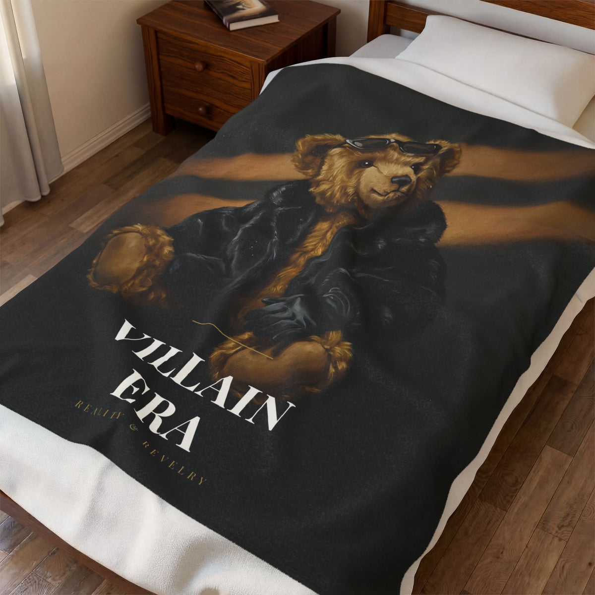 Villain Era plush velveteen throw blanket with a painted bear in a black faux fur coat and sunglasses, size comparison chart