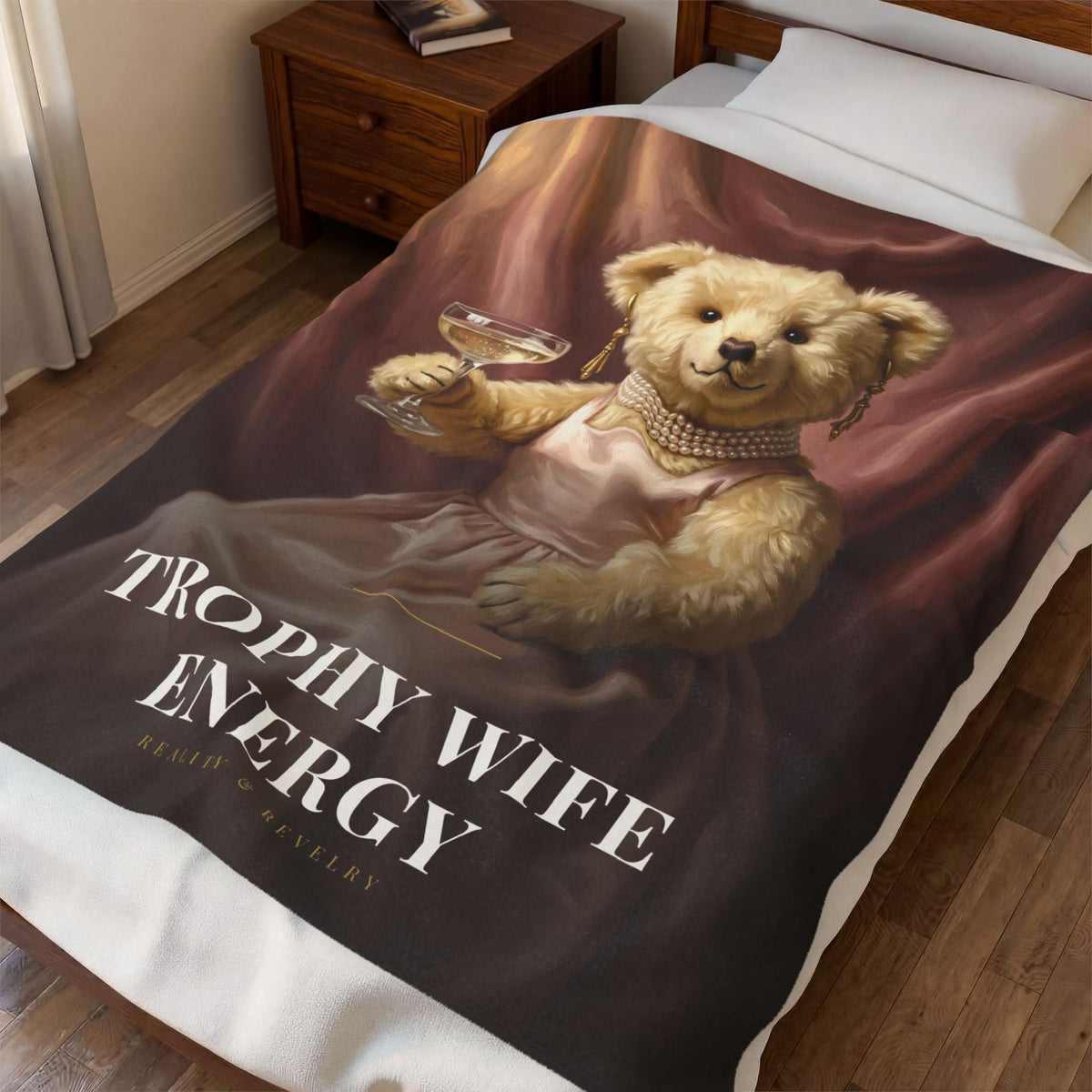 Trophy Wife Energy plush velveteen throw blanket with a painted bear in a blush satin gown holding a champagne coupe, size comparison chart