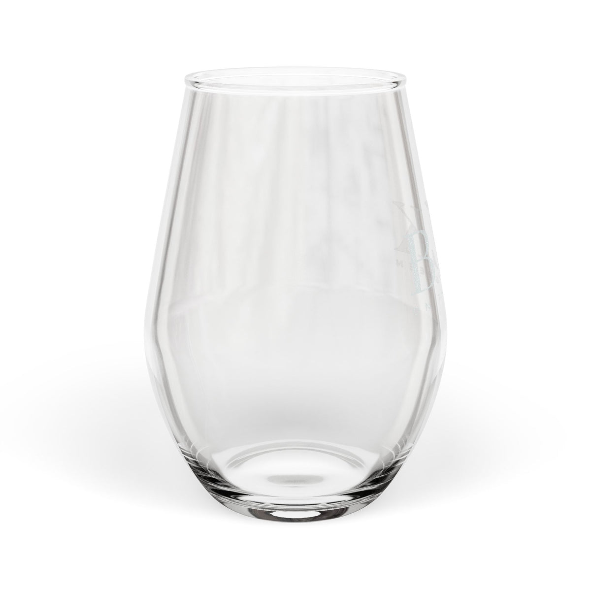 BLK on the Green engraved stemless wine glass with a frosted etched brand lockup, shown from the side
