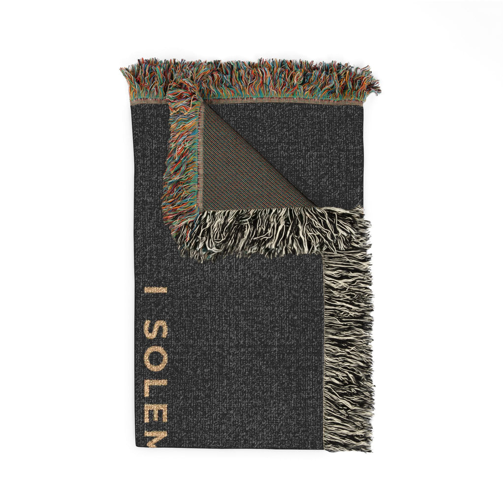 I Solemnly Swear I'm Up to No Wine woven blanket, folded to show the fringed edge and woven cotton texture