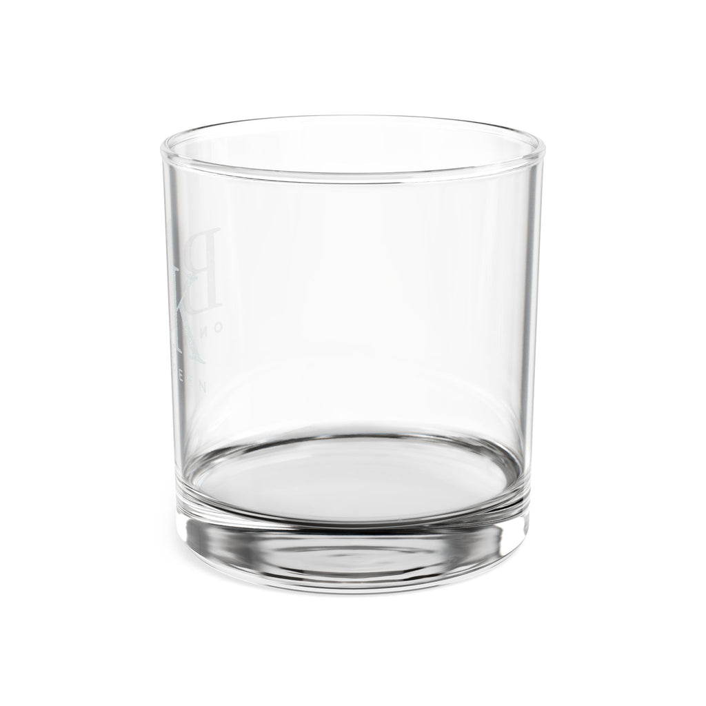 BLK on the Green engraved 10.5oz rocks glass at an angle, the engraving catching the light