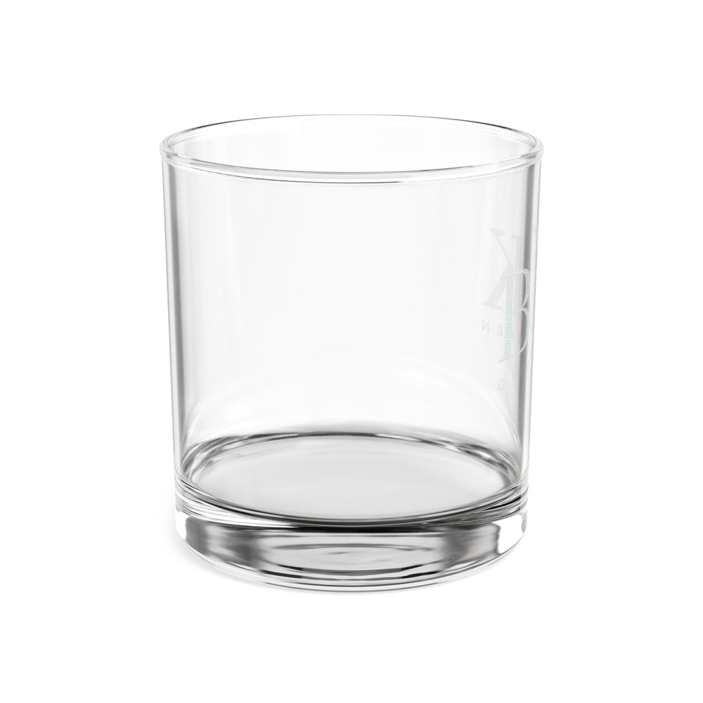 BLK on the Green engraved rocks glass turned to show the heavy weighted base