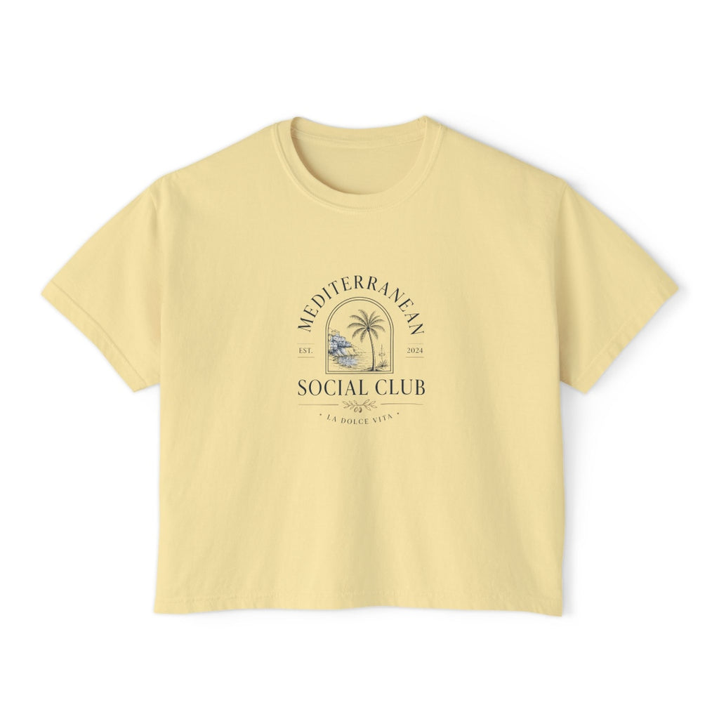 Butter yellow boxy tee with a navy Mediterranean Social Club crest and La Dolce Vita text