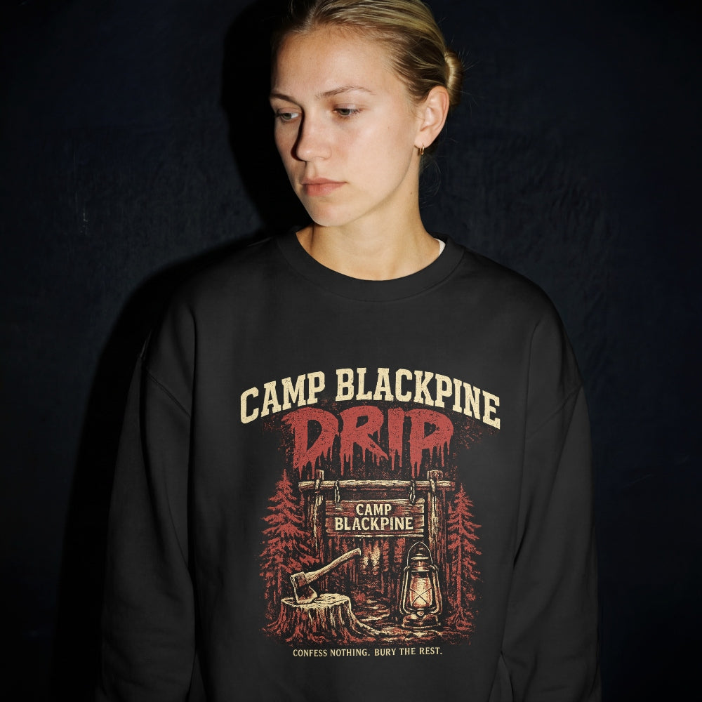 Woman wearing the black Camp Blackpine Drip retro horror varsity crewneck sweatshirt