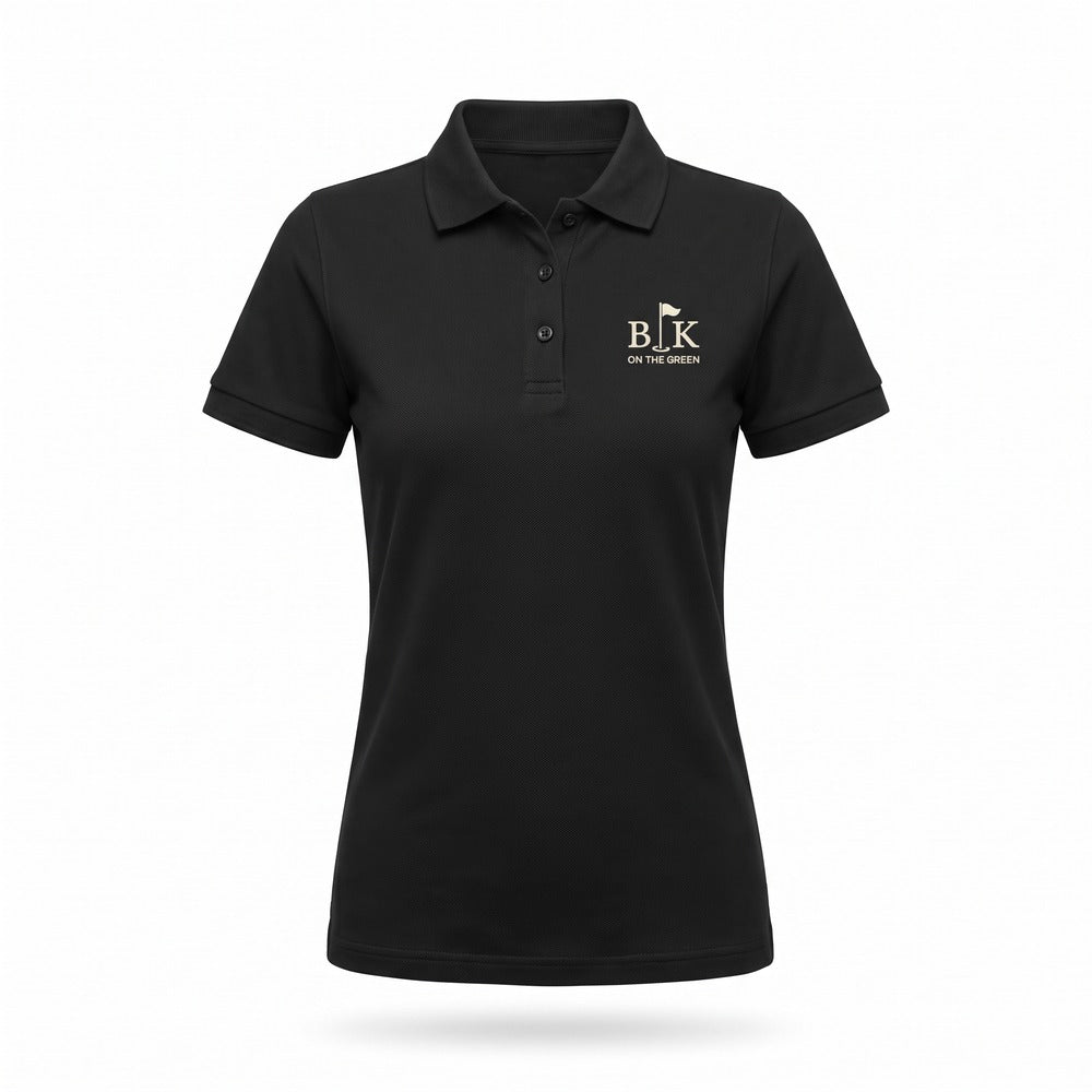The Clubhouse Polo for women in black with the cream BLK on the Green chest mark, shown on a plain white background
