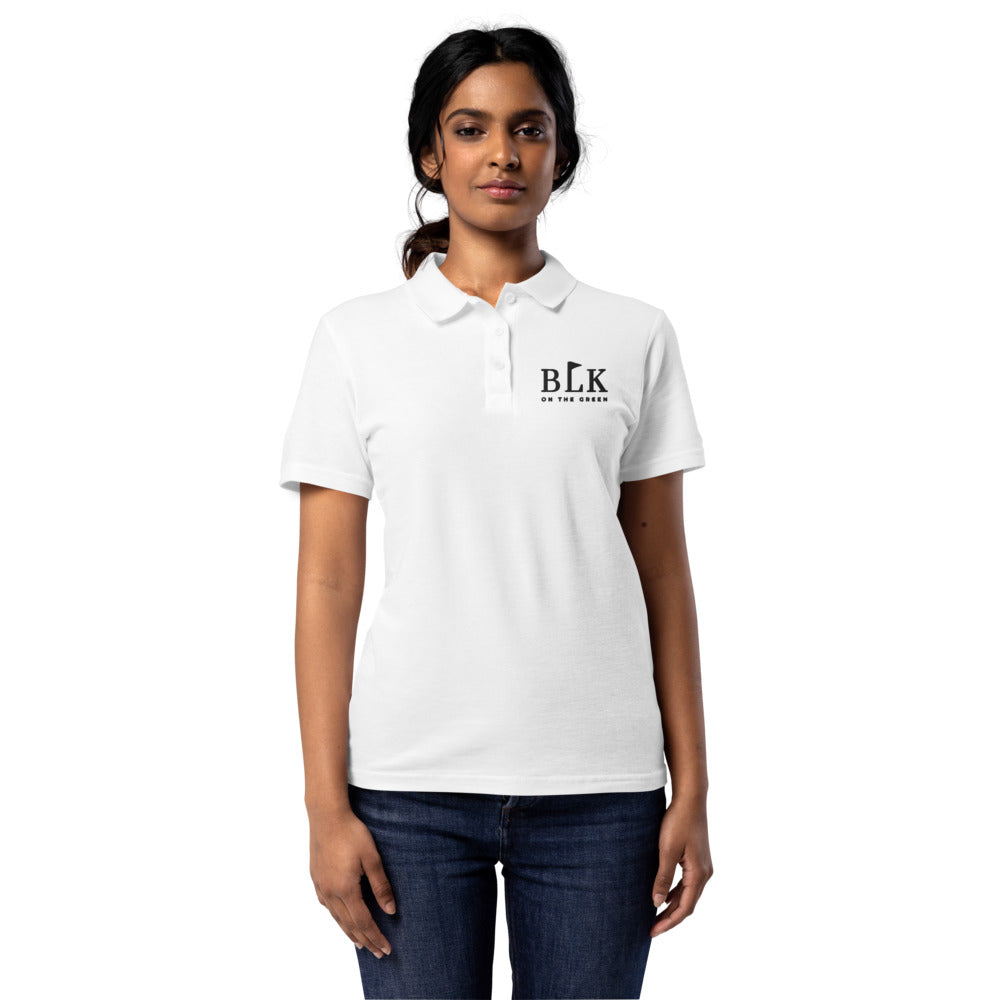 The women's Clubhouse Polo in white with the BLK on the Green mark embroidered in black