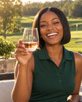 Lifestyle photo of the BLK on the Green Engraved Stemless Wine Glass