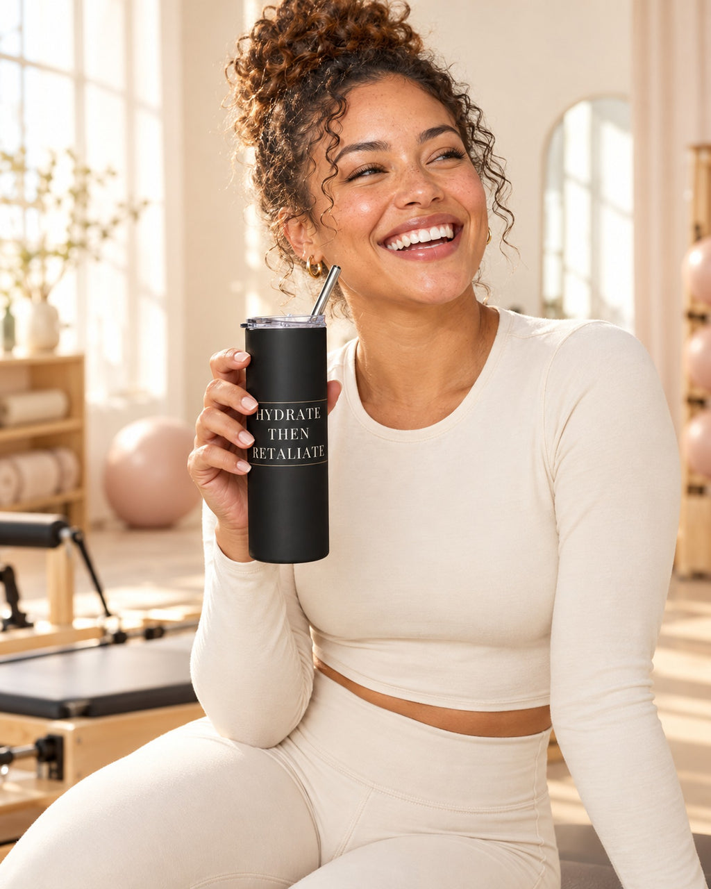 Lifestyle photo of the Hydrate Then Retaliate Skinny Tumbler